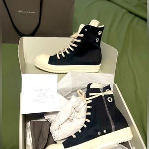 Brand New Rick Owens sneakers never worn still in box.